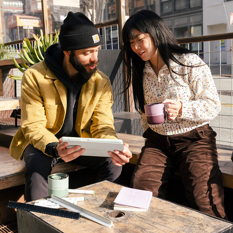 12oz-rise-mug-l8 12oz_rise_coffee_mug_dusty_orchid_couple_city_patio_square.jpg