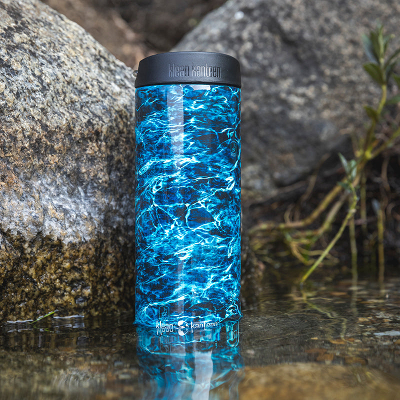 20oz-tkwide-with-cafe-cap-mossy-oak-e5 16oz_tumbler_mossyoak_bass_cafe_water_closeup_square.jpg