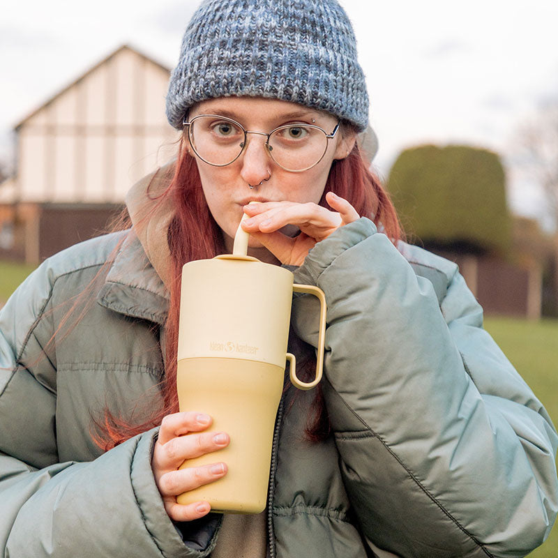 26oz-rise-tumbler-with-straw-lid-t7 26oz_rise_rumbler_straw_wax_yellow_woman_sip_square.jpg