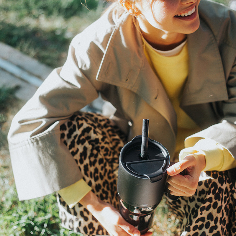 26oz-rise-tumbler-with-straw-lid-t7 26oz_rise_tumbler_black_woman_topview_square.jpg