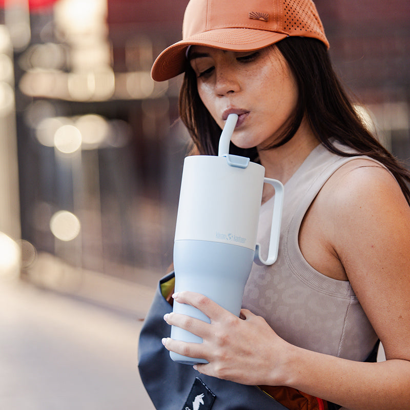 36oz-rise-tumbler-with-straw-lid-u6 36oz_rise_tumbler_straw_girl_sip_square.jpg