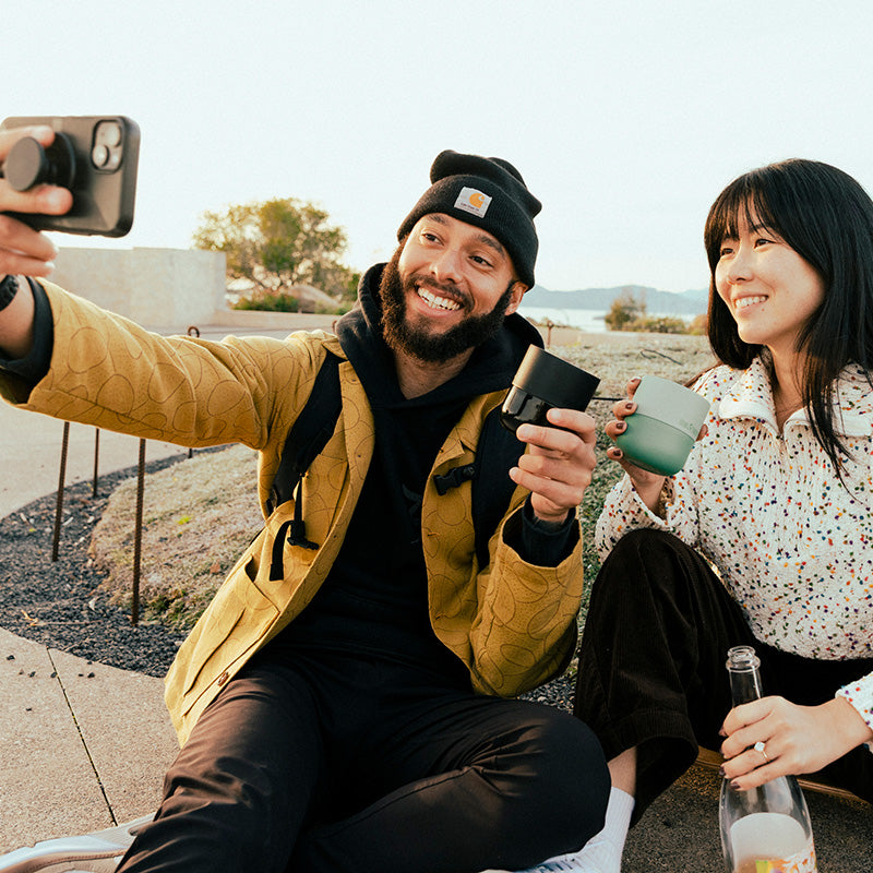 bring-your-own-party-kit-tumblers-and-cocktails-z2 8oz_rise_lowball_black_iceberg_couple_selfie_city_square.jpg