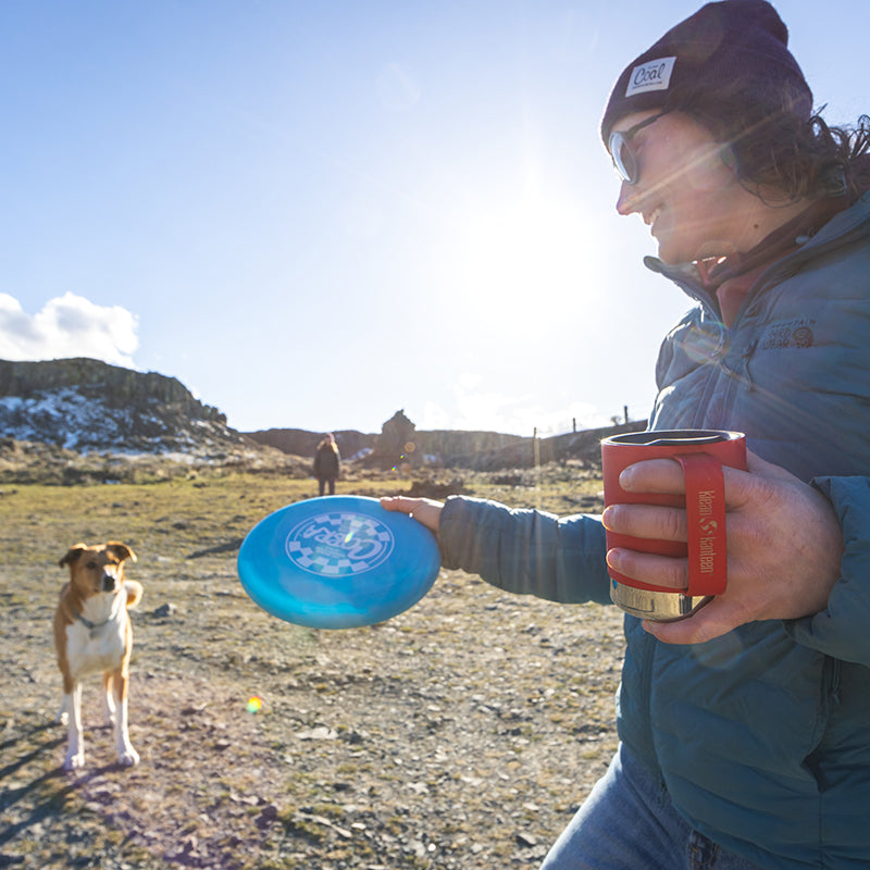 12oz-camp-mug-t1 insulated_camp_mug_12oz_woman_dog_frisbee_square.jpg