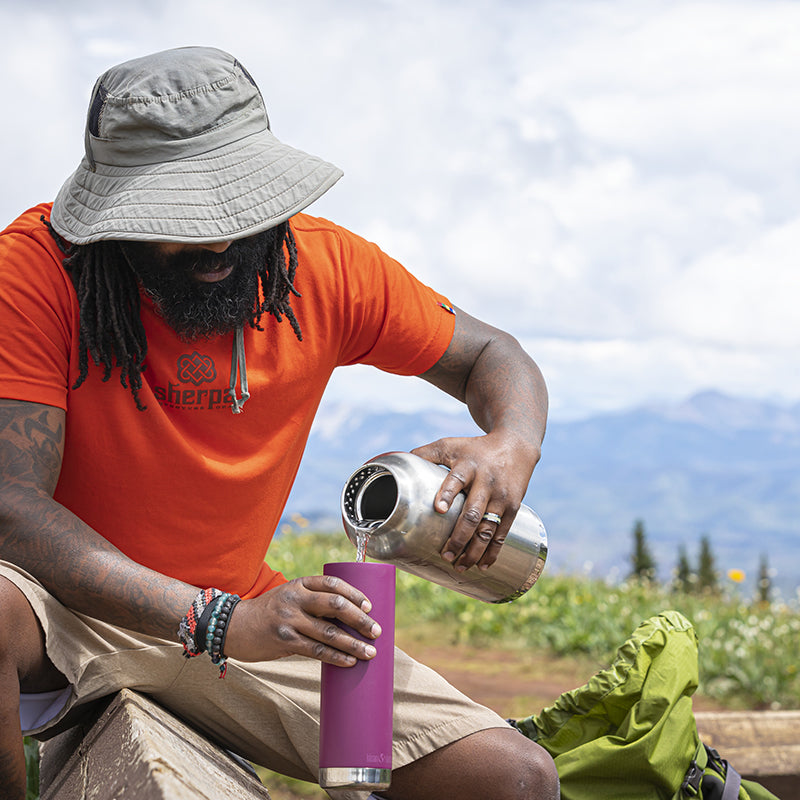 64oz-tkwide-with-loop-cap-e1 tkwide_64oz_bottle_backpacker_mountains_filling_square.jpg
